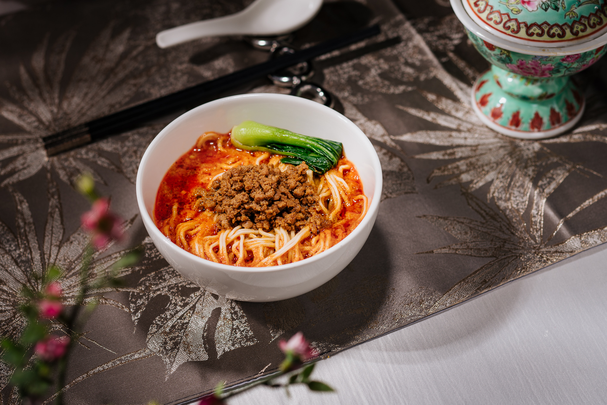 a bowl with a red spicy-looking soup